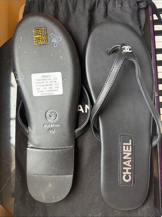 CHANEL Shoes - CHANEL Black Leather Logo Thong Sandals with Silver CC Charm